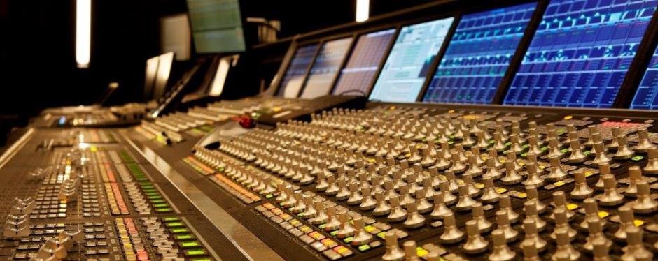 You can see a mixing console in a recording studio.